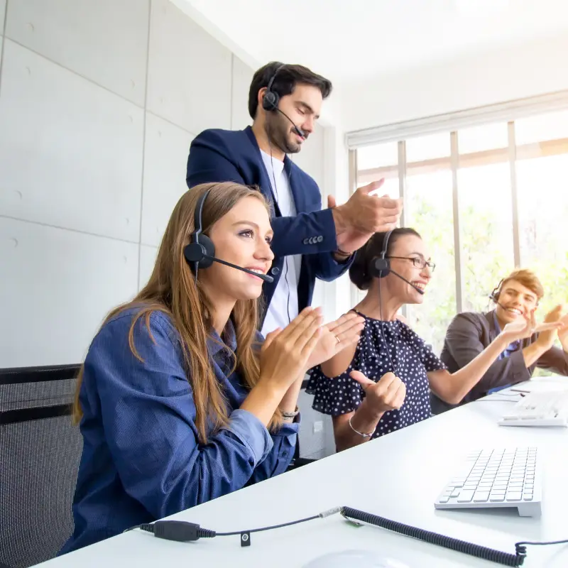 Customer support team assisting clients for website development and digital marketing services